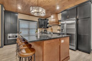 Chef’s Kitchen with Granite Island Bar