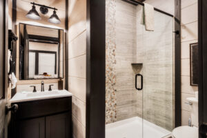 Modern Bathroom with Walk-In Shower and Vanity Lighting