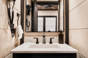 Bathroom Vanity with Mirror and Wall-Mounted Hairdryer