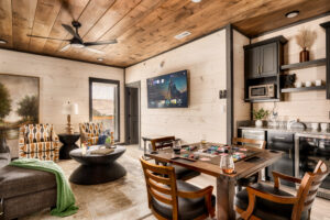 Entertainment Space with Poker Table, TV & Seating Setup