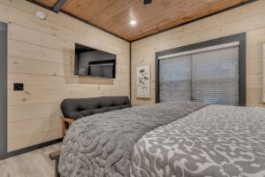 King Bedroom Featuring Smart TV And Futon