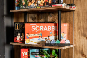 Board Game Shelf with Scrabble, Chess, and Poker Chips