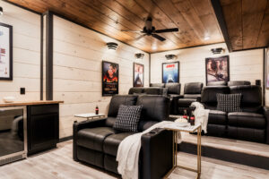 Movie Room with Leather Recliners, Mini Fridge, and Surround Sound